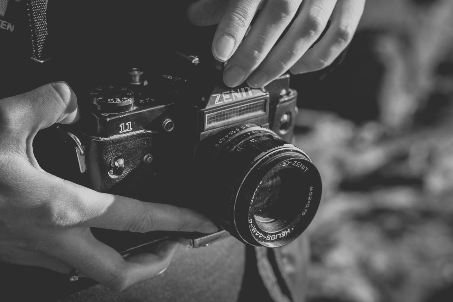 Workshop participant working on video editing project with focused attention